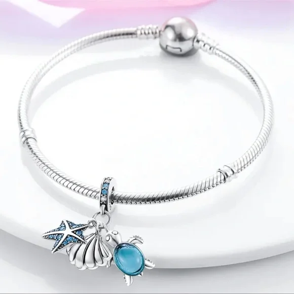 Sterling Silver Ocean Charm with  Blue Accents - Picture 3 of 3